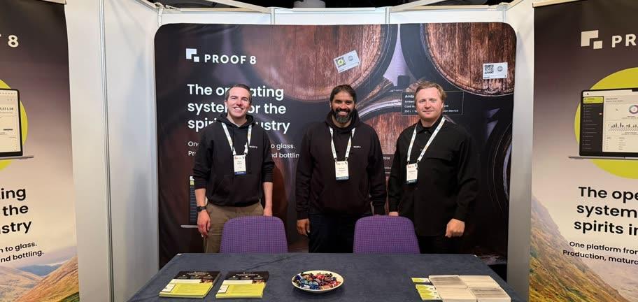 Proof 8 team at a trade show booth