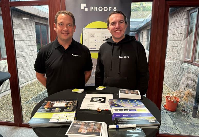 Proof 8 team at an industry event